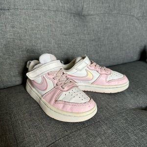 Pink and white kids Nike Dunks